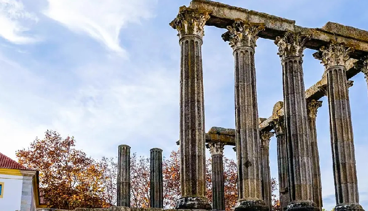 portugal,visit portugal,must-visit places,portuguese culture,portuguese cuisine,lisbon,porto,sintra,algarve,douro valley,Évora,coimbra,azores,tourism in portugal,european travel,cultural heritage,historical landmarks,coastal beauty,natural landscapes,unesco world heritage sites,european destinations,travel experiences,exploration,adventure,sightseeing,landmarks,vacation spots,coastal attractions,scenic beauty,cultural diversity,architecture,local traditions,gastronomy,wine tourism,vineyards,outdoor activities,nature walks,hiking trails,island hopping,sustainable tourism