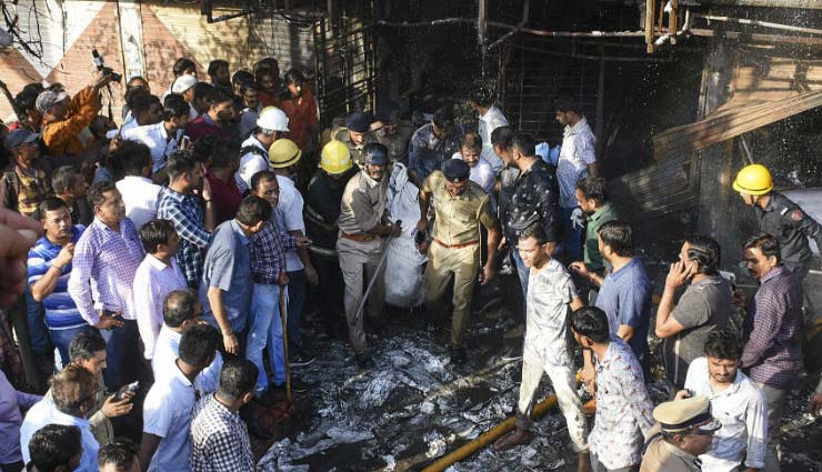 families,identified,dead bodies,watching,clock,mobile,coaching fire,surat fire,surat,fire in coaching center,news,news in hindi