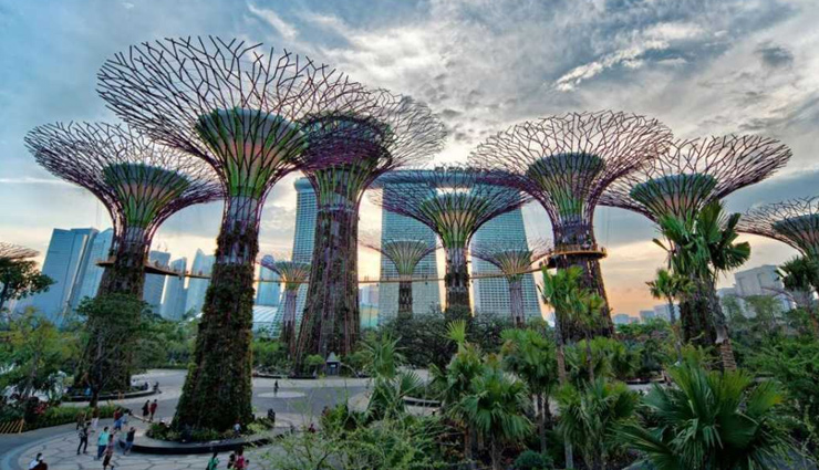 singapore fusion architecture,multicultural identity singapore,colonial and contemporary singapore,indian chinese european influences,cultural tapestry singapore,architectural marvels singapore,marina bay sands attractions,singapore flyer views,buddha tooth relic temple,night safari singapore,botanic gardens biodiversity,gardens by the bay horticulture,raffles hotel colonial charm,clarke quay asian european ambiance,resorts world sentosa entertainment,orchard road shopping haven,christmas orchard road spectacle,unique singapore experiences,singapore tour packages,southeast asia travel destinations