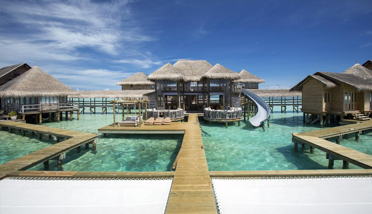 exotic beach resorts in the world,10 exotic beach resorts in the world,gill lankanfushi,viceroy anguilla,the st regis bora bora resort,mandarin oriental,acqualina resort,montage laguna beach,watercolor inn,the ritz-carlton,ocean house,sugar beach,travel,holidays,travel guide,holidays