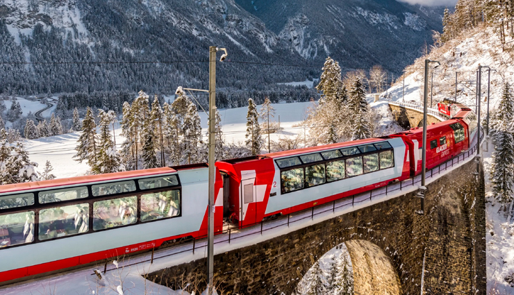 scenic rail routes in switzerland,swiss holiday rail journeys,glacier express switzerland,bernina express unesco,goldenpass line landscapes,wilhelm tell express itinerary,jungfrau express panoramic view,switzerland tour package,swiss vacation destinations,rail journeys through swiss landscapes,swiss rail travel experiences,spectacular views on swiss trains,swiss alps train routes,swiss railway adventures,switzerland sightseeing by train,swiss travel highlights,unesco world heritage rail journeys,scenic beauty of swiss railways,swiss holiday destinations by rail,best train routes in switzerland