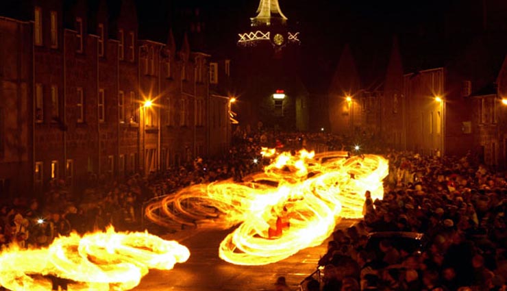 6 amazing new year traditions from around the world,effigy burning in panama,great balls of fire in scotland,red underwear in turkey,108 rings in japan,underwater tree planting in siberia,cemetery sleepover in chile