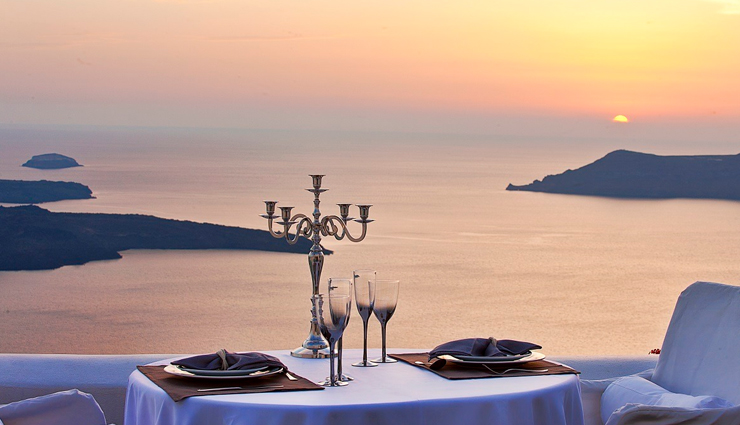 greece,romantic things to do in greece,places to visit in greece,athens city,beach holiday in crete island,sunset in santorini,partying in mykonos,romantic candle light dinner at a rooftop restaurant,ride an atv around santorini