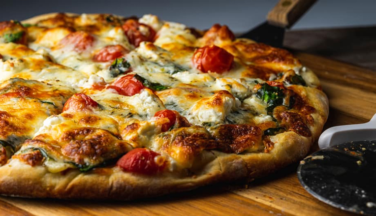 types of pizza,pizza varieties,global pizza styles,national pizza day,pizza around the world,international pizza flavors,neapolitan pizza,new york style pizza,chicago deep dish pizza,greek pizza,turkish lahmacun,california pizza,japanese okonomiyaki,spanish pizza,korean pizza,pizza toppings,pizza crust types,pizza traditions,pizza culture,pizza culinary journey