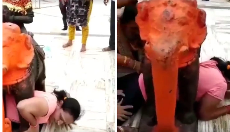 मुराद पूरी करने के चक्कर में ये महिला फंसी हाथी की मूर्ति के नीचे, वीडियो वायरल