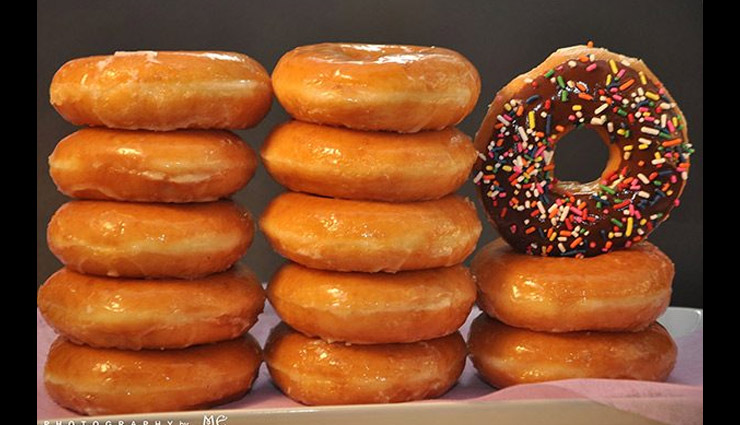 guinness world record,crazy guinness world record,most big macs consumed,most rotations hanging from a power drill in one minute,the fastest half-marathon pushing a pram,most stamps licked in one minute,tallest stack of donuts