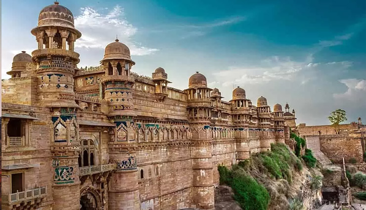 tourist attractions in madhya pradesh,khajuraho temples visit,bandhavgarh national park safari,pachmarhi hill station guide,bhopal travel highlights,kanha national park tour,orchha historical sites,ujjain pilgrimage destinations,sanchi buddhist stupas,gwalior fort and palaces