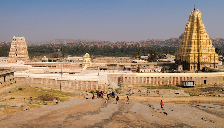 karnataka,karnataka tourist places,honeymoon in karnataka,honeymoon in hampi,hampi tourist plaes,virupaksha temple,elephant stables hampi,queens bath hampi,matanga hill hampi,lotus mahal hampi,monolithic bull hampi,best time to visit hampi,how to reach hampi,best time to reach hampi,hampi tourism,holidays,travel,india tourism,tourist places in india