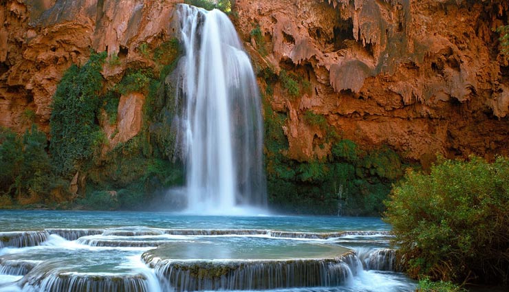 chile,australia,northern ireland,5 breathtaking places to visit once in a lifetime,best places in the world,whitehaven beach,the fairy pools on the isle of skye,scotland,marble caverns of carrera lake,havasu falls,grand canyon national park,the dark hedges