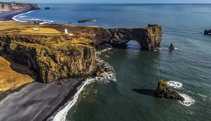 iceland,places to visit in iceland,hallgrimskirkja,dyrholaey,ice caves in vatnajokull glacier,catch the kaleidoscope of colors in the northern lights