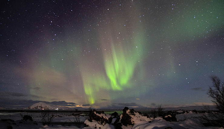 iceland,places to visit in iceland,hallgrimskirkja,dyrholaey,ice caves in vatnajokull glacier,catch the kaleidoscope of colors in the northern lights