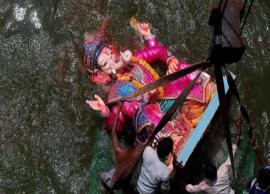 Devotees immerse Ganpati Bappa early as their homes get submerged under floodwater in Mumbai