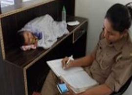 Social media applauds mother cop with baby at work, UP Police chief explores crèche options