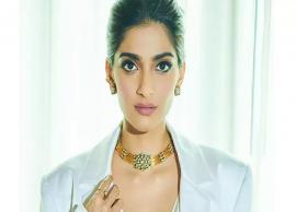 PICS- Sonam Kapoor looks radiant as she ditches her bra in a bold white outfit