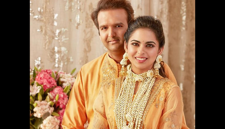 PICS- Sabyasachi Mukherjee Shares Throwback Pic of Isha Ambani, Anand Piramal twinning at Haldi ceremony