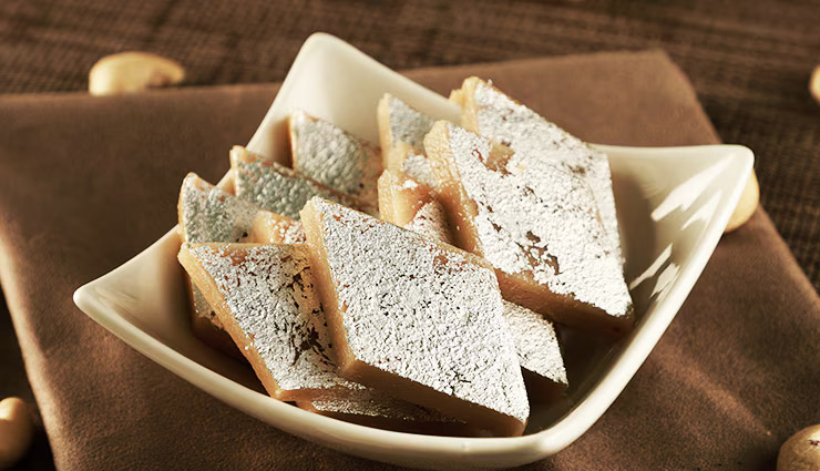 kaju barfi recipe for diwali,how to make kaju katli at home,traditional indian sweets for diwali,step-by-step kaju barfi recipe,cashew barfi recipe,homemade kaju katli,diwali sweets recipes,easy kaju barfi preparation,kaju barfi with silver leaf decoration,indian festive sweets recipes