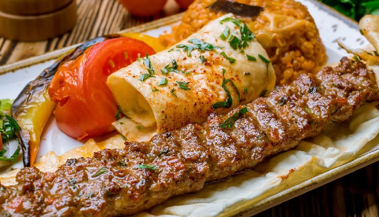 turkish cuisine,turkish dishes,must-try turkish food,turkish pretzel simit,turkish apple tea,ezogelin soup,menemen breakfast,gözleme crepe,mantı ravioli,kumpir baked potato,köfte meatballs,perde pilav,turkish mezze,turkish kebap,baklava pastries,dondurma ice cream,turkish delights lokum,turkish street food,ottoman cuisine,best turkish foods