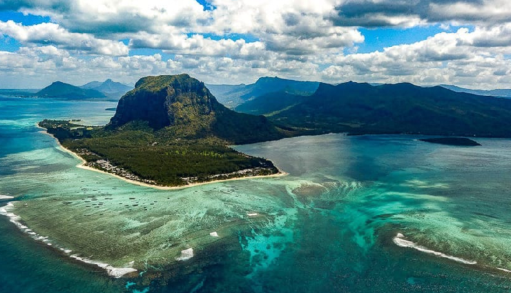 mauritius travel experiences,things to do in mauritius,explore mauritius attractions,adventure activities mauritius,belle mare water sports,deep sea fishing mauritius,le morne brabant hike,grand bassin temples visit,seven coloured earth tour,underwater waterfall helicopter tour