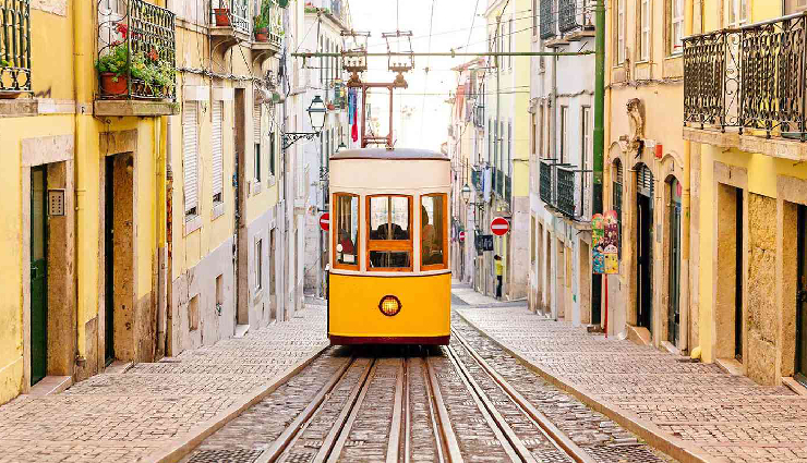 portugal,visit portugal,must-visit places,portuguese culture,portuguese cuisine,lisbon,porto,sintra,algarve,douro valley,Évora,coimbra,azores,tourism in portugal,european travel,cultural heritage,historical landmarks,coastal beauty,natural landscapes,unesco world heritage sites,european destinations,travel experiences,exploration,adventure,sightseeing,landmarks,vacation spots,coastal attractions,scenic beauty,cultural diversity,architecture,local traditions,gastronomy,wine tourism,vineyards,outdoor activities,nature walks,hiking trails,island hopping,sustainable tourism