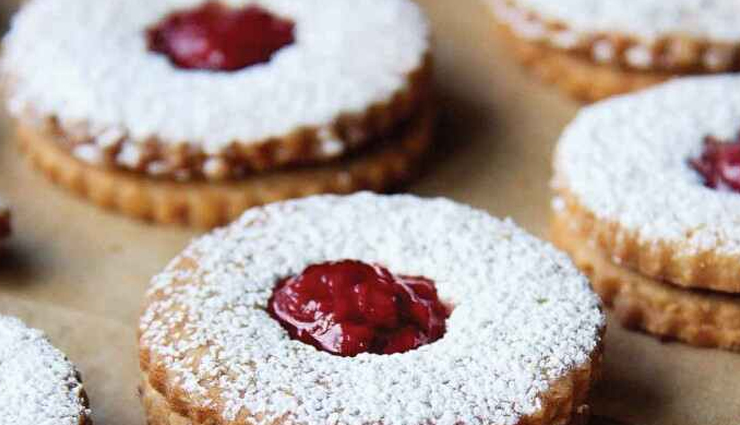 linzer cookies recipe,modern twist on linzer cookies,classic linzer cookies,homemade linzer cookies,jam-filled cookies,traditional linzer cookie recipe,linzer cookie variations,almond cookie recipe,linzer cookie assembly,linzer cookie decorating,best linzer cookies,holiday cookie ideas,elegant cookie recipes,raspberry jam cookies,linzer cookie baking tips,timeless dessert favorites,linzer cookie cutting techniques,cookie decorating ideas,festive cookie creations,linzer cookies with a twist