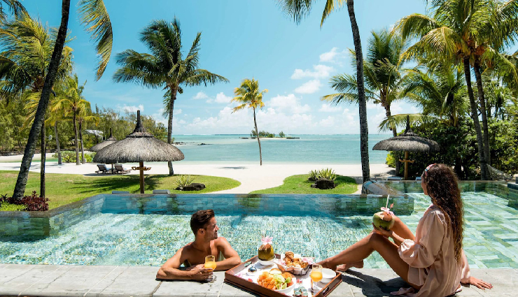 reasons why choose mauritius honeymoon,mauritius honeymoon,luxury hotels,adventure sports,mauritian cuisine,street food,picture-perfect moments,breathtaking beaches,turquoise lagoons,romantic experience,couple massages,tropical paradise,romantic destinations,scenic landscapes,natural beauty,honeymoon activities,scuba diving in mauritius,skydiving adventures,golfing in mauritius,cultural fusion,chinese cuisine,european flavors,indian spices,exotic street food,doll puri,chicken curry,street food delights,memorable photography,captivating backdrops,warm blue waters,romantic sunset strolls,dreamy beach experiences,idyllic travel destination