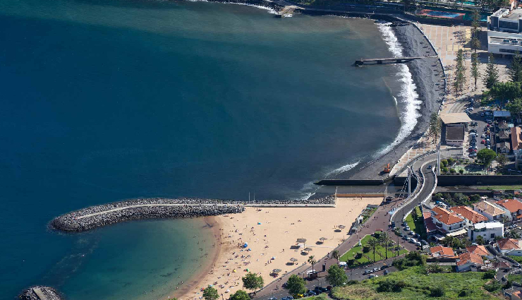 madeira island tourist attractions,funchal madeira attractions,pico do arieiro madeira,cabo girao madeira,monte palace tropical garden,valley of the nuns madeira,porto moniz natural pools,laurisilva of madeira forest,machico madeira sights,ponta do sol madeira landmarks