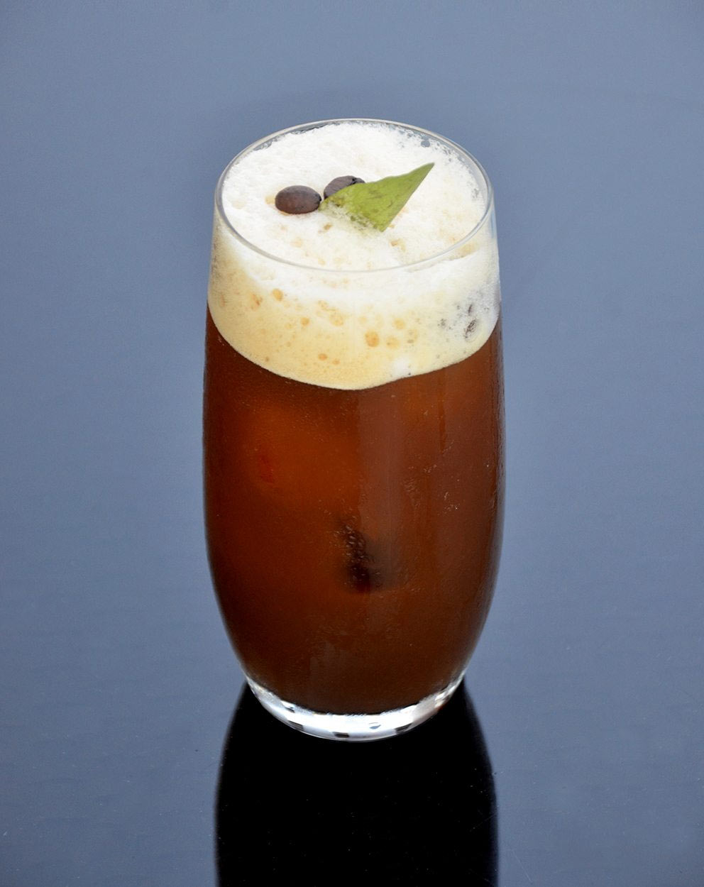 famous tea around the world,famous coffee around the world,famous drinks around the world,madras cafe,mumbai,kopi luwak martini,beijing,two birds with one stone,scottsdale,kuda coffee,maldives,grog,florence