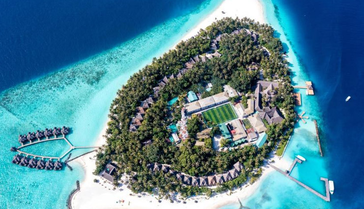 10 tourist attractions in maldives,must-visit places in maldives,top maldives tourist spots,popular islands in maldives,best beaches maldives,maldives honeymoon destinations,male atoll maldives,maldives snorkeling spots,vaadhoo island bioluminescence,rangali island luxury resorts,hanifaru bay marine life.
