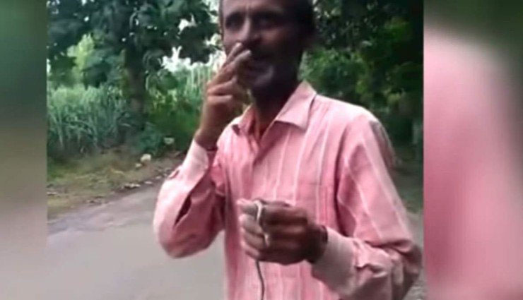 man eats snake,uttar pradesh ,उत्तर प्रदेश,अमरोहा