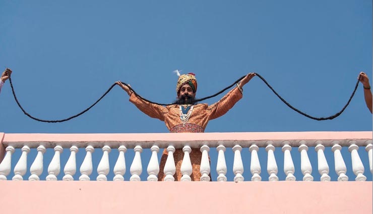 7 guinness world records that are from jaipur,man with the longest mustache,temple with a marvelous feat of architecture,worlds largest display of lamps,worlds largest silver vessel,worlds biggest sports trophy,biggest bhoomi poojan,maximum number of comments on social media