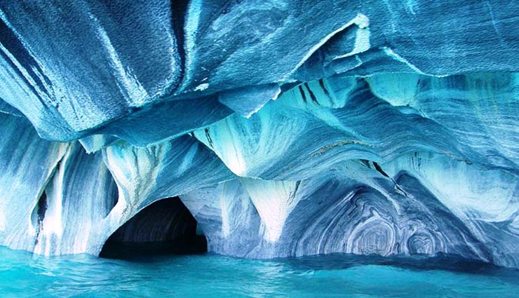 chile,australia,northern ireland,5 breathtaking places to visit once in a lifetime,best places in the world,whitehaven beach,the fairy pools on the isle of skye,scotland,marble caverns of carrera lake,havasu falls,grand canyon national park,the dark hedges