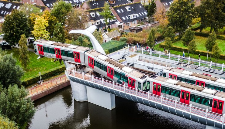 whale,whale sculpture,metro train,midair,weird news,netherland