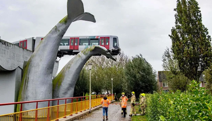 whale,whale sculpture,metro train,midair,weird news,netherland