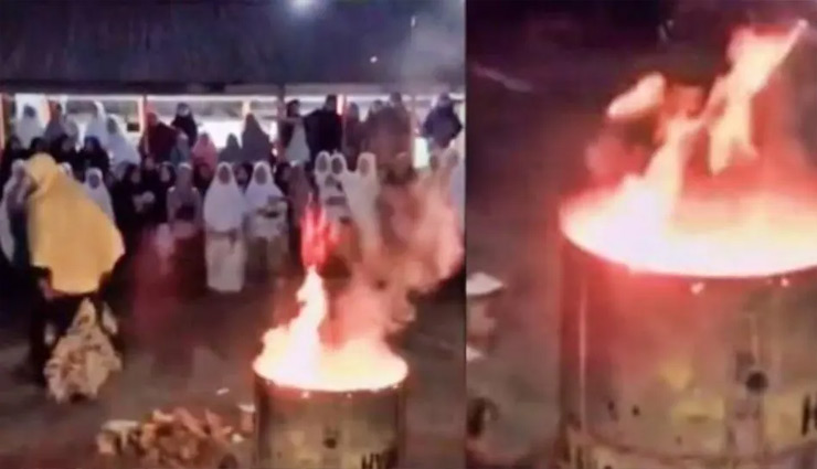 महिला ने आग में जला दिए आईफोन समेत कई मोबाइल फोन, वीडियो हुआ वायरल