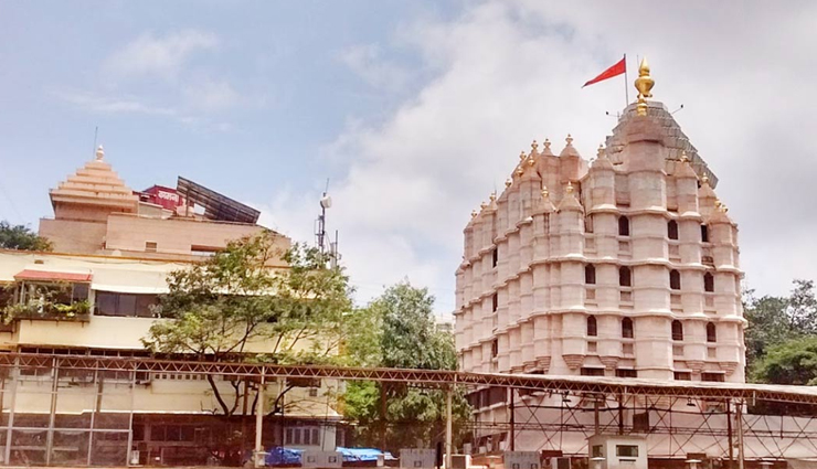 tourist attractions in mumbai,mumabi,kanheri caves,the gateway of india,global vipassana pagoda,shree siddhivinayak temple,girgaon chowpatty