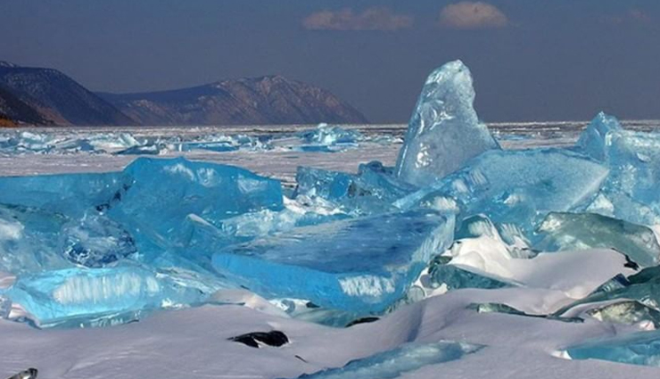 mysterious places,beautiful places on earth,mysterious places on earth,tulip fields,netherlands,tunnel of love,ukraine,salar de uyuni,bolivia,hitachi seaside park,japan,slope point,new zealand,tianzi mountains,china,emerald ice,russia,giants causeway,northern ireland,glowing beach,maldives