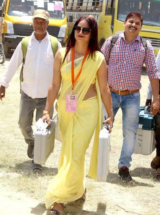 woman,polling,officer,yellow,saree,photo,viral,lok sabha,election,2019,uttar pradesh