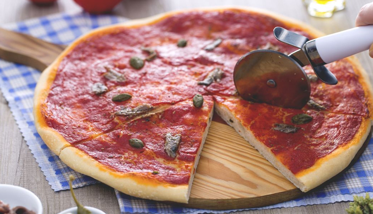 types of pizza,pizza varieties,global pizza styles,national pizza day,pizza around the world,international pizza flavors,neapolitan pizza,new york style pizza,chicago deep dish pizza,greek pizza,turkish lahmacun,california pizza,japanese okonomiyaki,spanish pizza,korean pizza,pizza toppings,pizza crust types,pizza traditions,pizza culture,pizza culinary journey