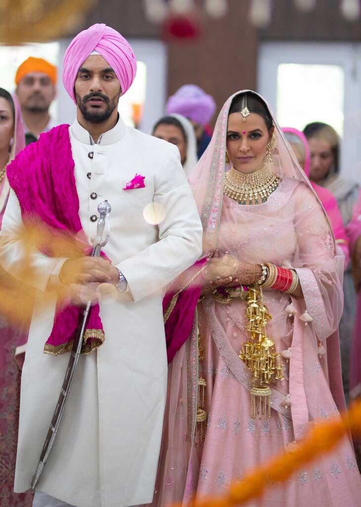 neha dhupia secretly ties knot with angad bedi,neha dhupia wedding pics,angad bedi,entertainment news