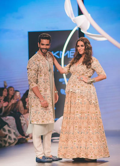 bollywood,neha dhupia,angad bedi,ramp walk,baby bump,lakme fashion week 2018