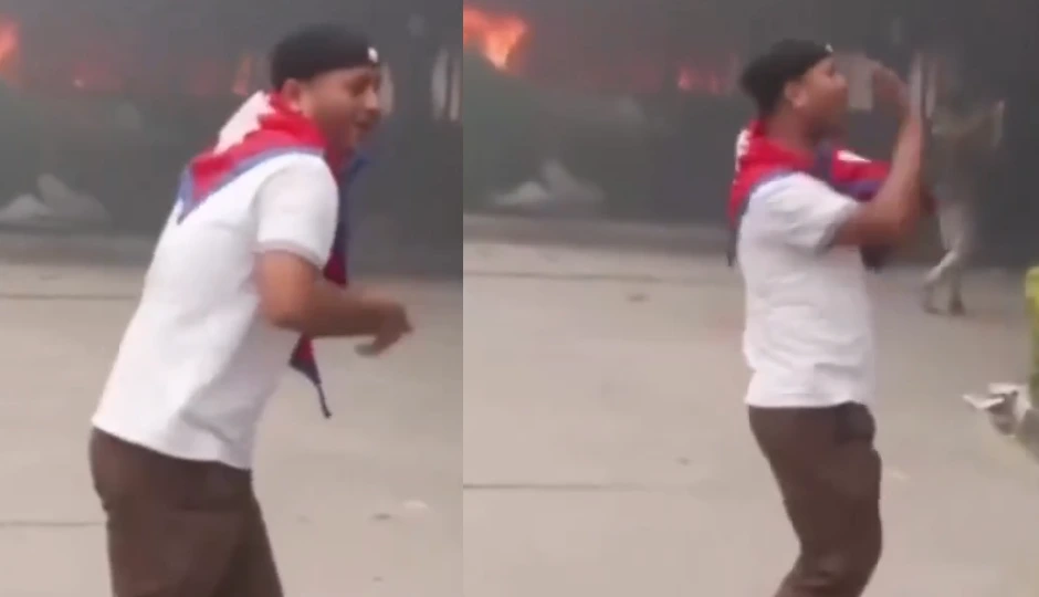 नेपाल: पीछे संसद धूं-धूं जल रही थी, सामने खड़ा प्रदर्शनकारी बना रहा था रील; वीडियो वायरल