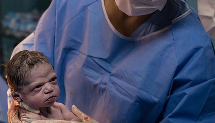 weird news,weird photo,weird child,hilarious photo,newborn baby