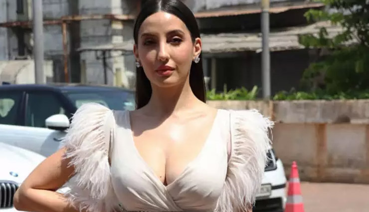 nora fatehi,nora fatehi fashion,nora fatehi fashion tips,nora fatehi in white feather frock,nora fatehi hot photos,fashion trends