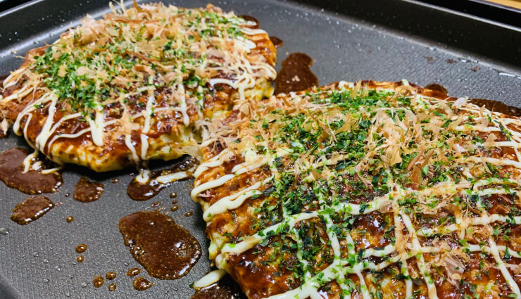 types of pizza,pizza varieties,global pizza styles,national pizza day,pizza around the world,international pizza flavors,neapolitan pizza,new york style pizza,chicago deep dish pizza,greek pizza,turkish lahmacun,california pizza,japanese okonomiyaki,spanish pizza,korean pizza,pizza toppings,pizza crust types,pizza traditions,pizza culture,pizza culinary journey