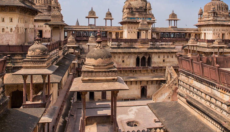 tourist attractions in madhya pradesh,khajuraho temples visit,bandhavgarh national park safari,pachmarhi hill station guide,bhopal travel highlights,kanha national park tour,orchha historical sites,ujjain pilgrimage destinations,sanchi buddhist stupas,gwalior fort and palaces