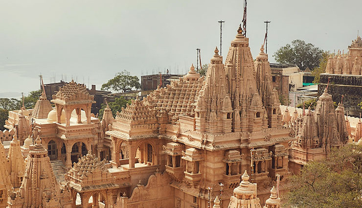 beautiful jain temples in india,jain temple architecture,intricate jain temples,spiritual jain temples india,jain pilgrimage sites,marble carvings jain temples,ornate jain temple sculptures,jain temple pillars,intricate ceiling designs,jain temple spire,jain tirthankaras temples,jain pilgrimage circuit,spiritual sanctity jain temples,jainism religious sites,jain temple prayers,guided tours of jain temples,cultural heritage jain temples,jain temple festivals india,jain temple art and culture,jain temple historical significance