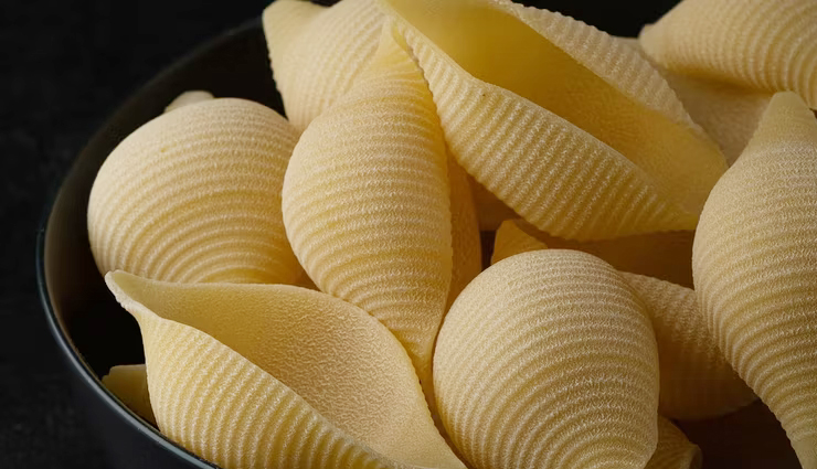 veggie stuffed shells,vegetarian stuffed shells,cheesy stuffed shells,flavorful stuffed shells,easy stuffed shells recipe,vegetarian dinner idea,meatless meal option,italian stuffed shells,baked stuffed shells,ricotta stuffed shells