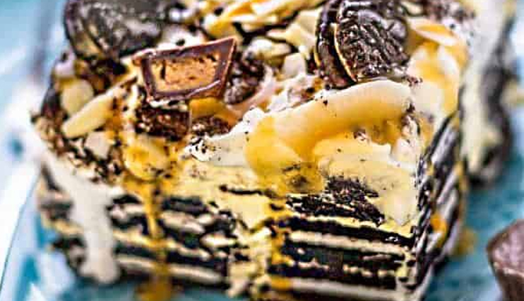 peanut butter oreo ice cream cake recipe,oreo cookie and peanut butter dessert,homemade ice cream cake,peanut butter ice cream cake with oreos,easy no-bake ice cream cake,creamy peanut butter dessert,step-by-step ice cream cake guide,decadent frozen treat,oreo cookie crust with peanut butter,whipped cream topped ice cream cake