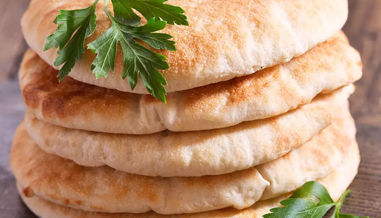 cheesy pita pocket recipe,crisp and delicious pita pockets,easy cheesy pita pocket recipe,homemade pita pocket with cheese,quick snack recipe: cheesy pita pockets,pita pocket filled with melted cheese,savory pita pocket recipe,vegetarian pita pocket recipe,cheesy appetizer recipe,pita pocket stuffed with vegetables and cheese