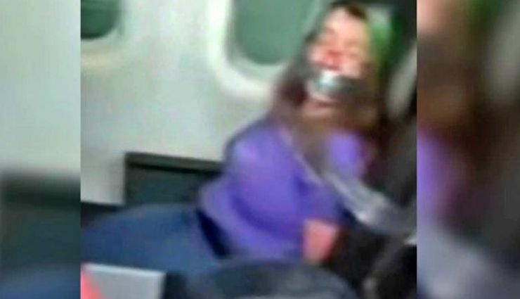 american airlines,female passenger,crew member